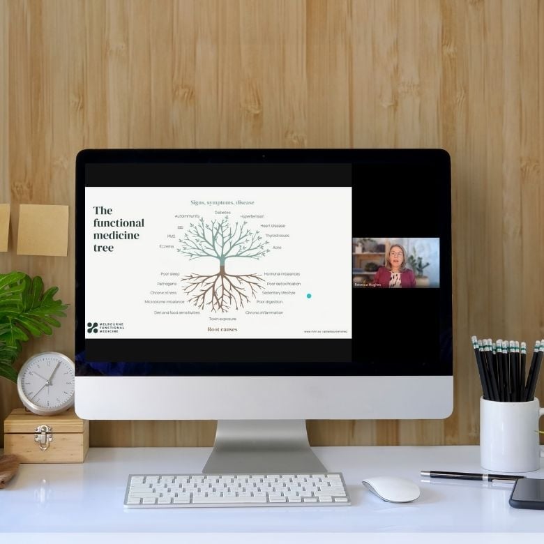 desktop monitor on desk displaying visual representation of functional medicine tree