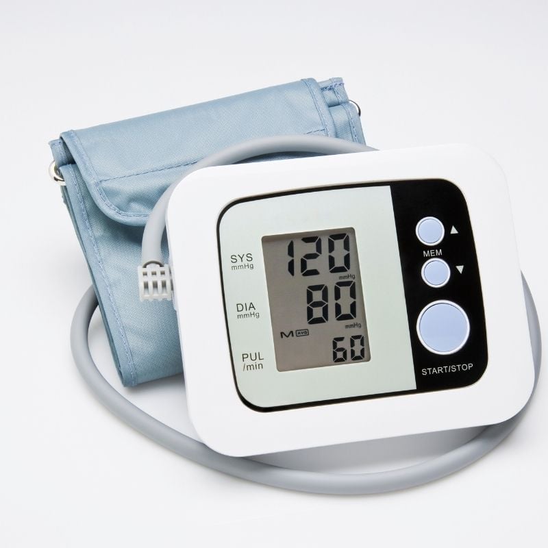 white blood pressure monitor that reads 120 80 60