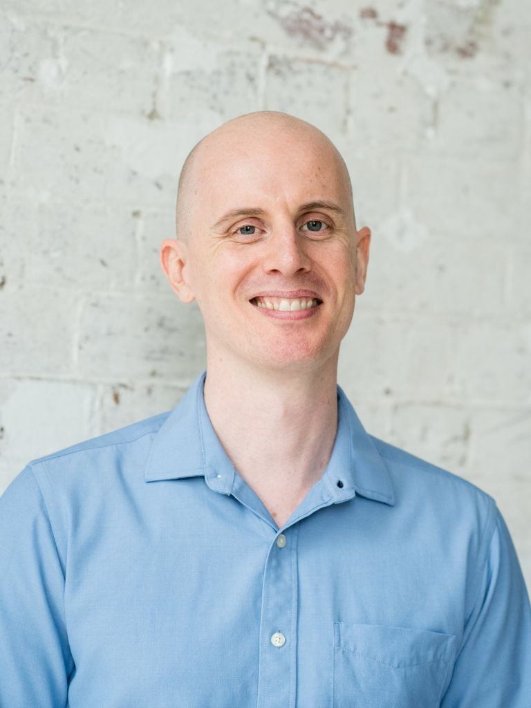 xr:d:DAFD1pBibxQ:238,j:31198830056,t:22072102 jabe brown functional medicine practitioner standing smiling