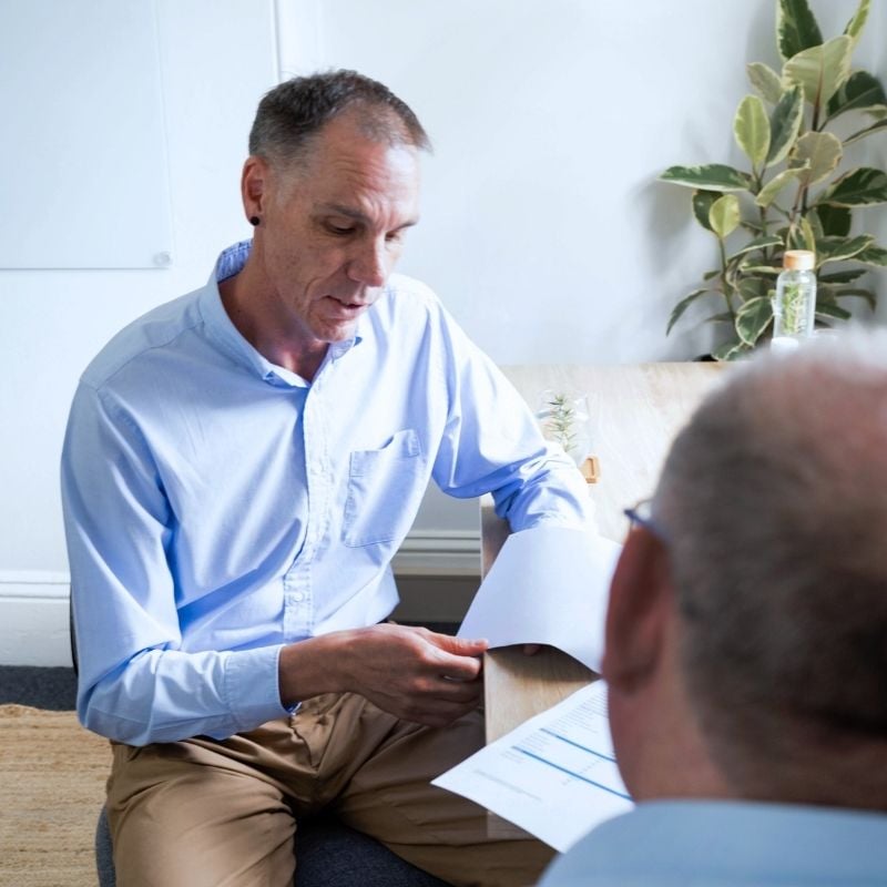 melbourne functional medicine practitioner mark payne discussing test results patient with type 1 diabetes